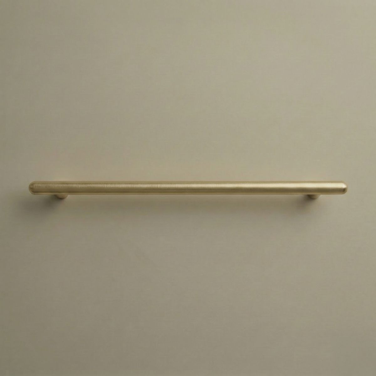 Satin brass Chapman & Bose Mineral metal bar pull, a long round bar on posts.
