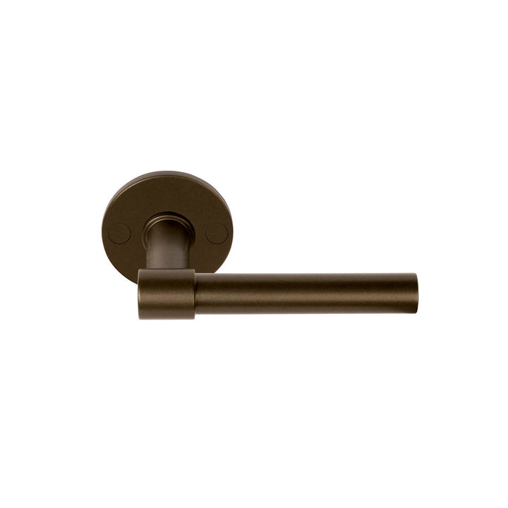 A close up of a Formani ONE by Piet Boon Door Lever with a white background.