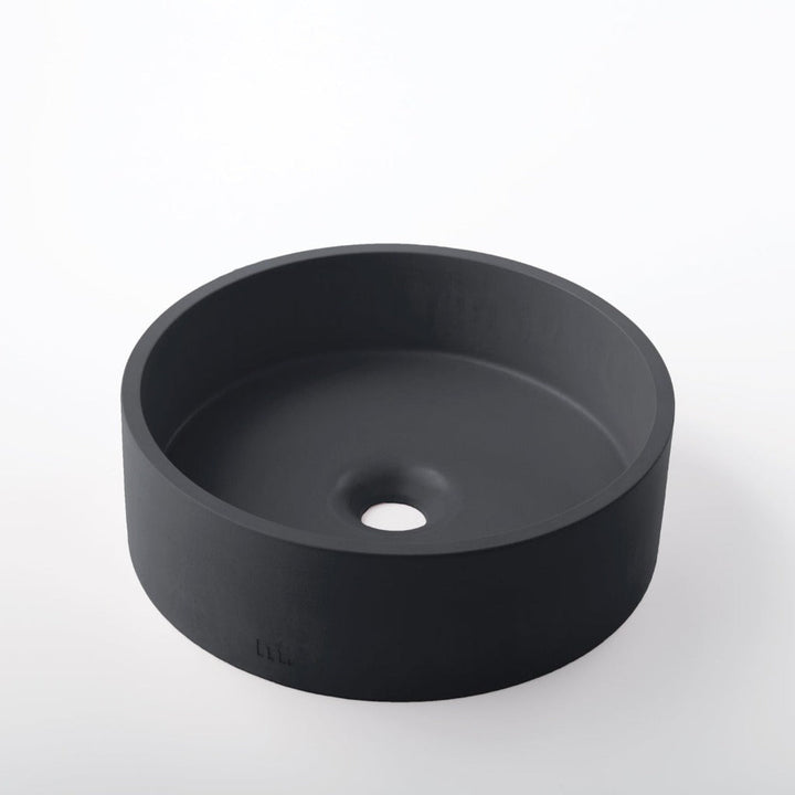A Mudd. Concrete Odet Basin SM on a white surface.