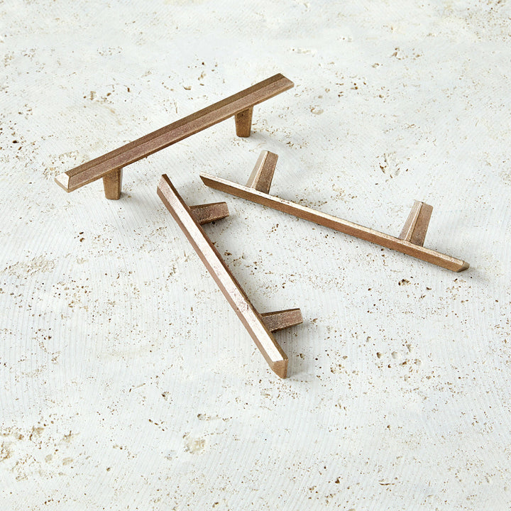 7" cabinet handle from Pyra collection in warm bronze.