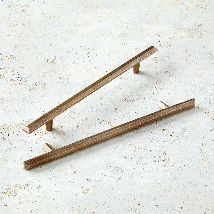 12" cabinet handles in warm bronze with modern shape.