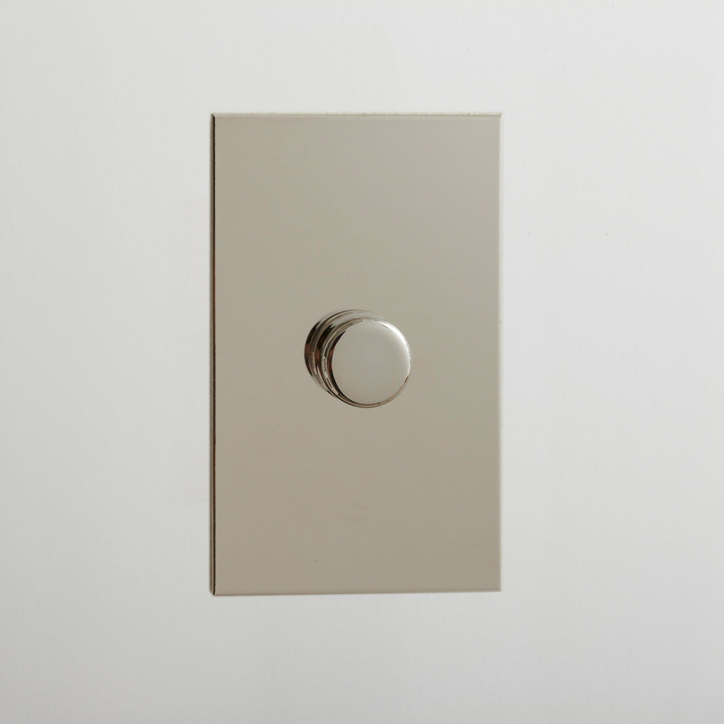 Forbes & Lomax rotary dimmer in nickel silver, angled view.