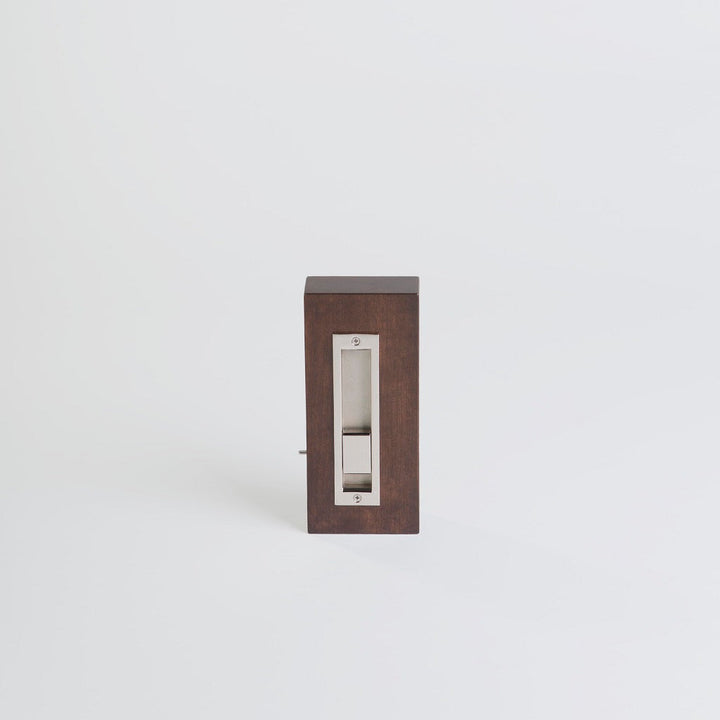 Door latch from the front of the door. Showing mechanism used to open and close.