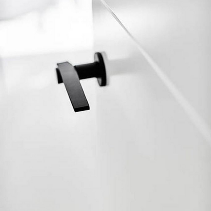A close up of a Formani TENSE BB100G Door Lever on a door.