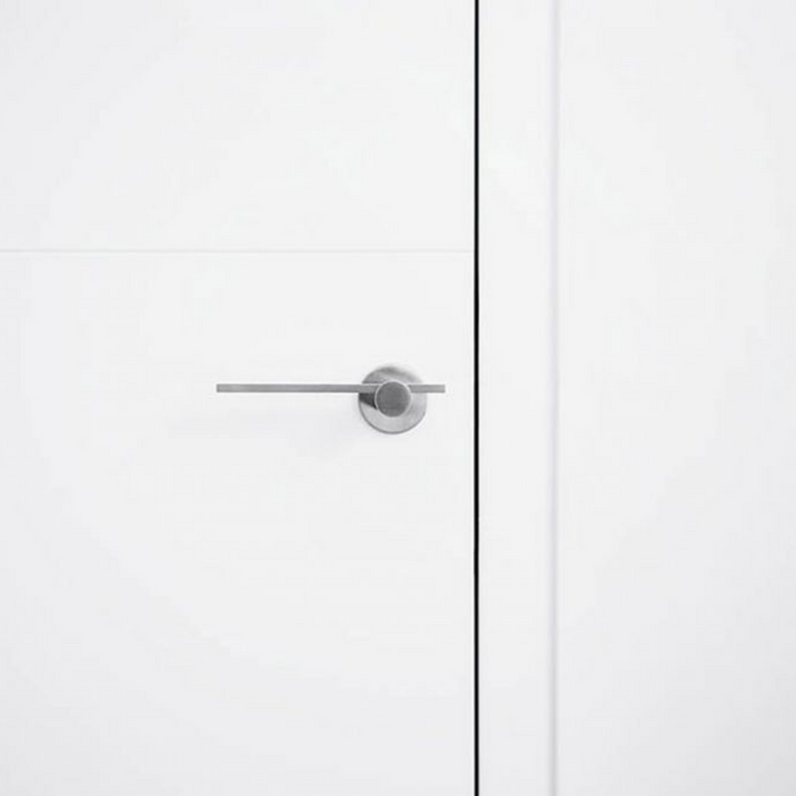A close up of a Formani TENSE BB100G Door Lever handle.