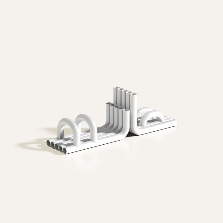 White TUBE Bookends photographed on an angle on a white background