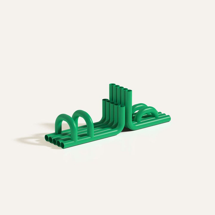 Green TUBE Bookends photographed on an angle on a white background