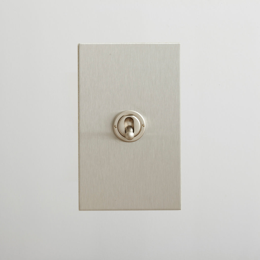 Forbes & Lomax multi gang toggle switch plate.