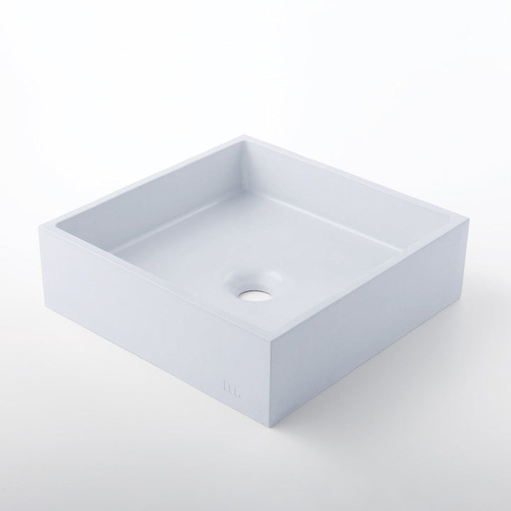 A mudd. concrete Yarra Basin SM sink on a white surface.