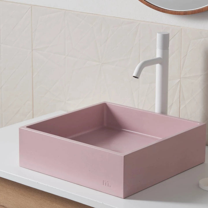 A mudd. concrete Yarra Basin SM bathroom sink with a soap dispenser and a mirror.