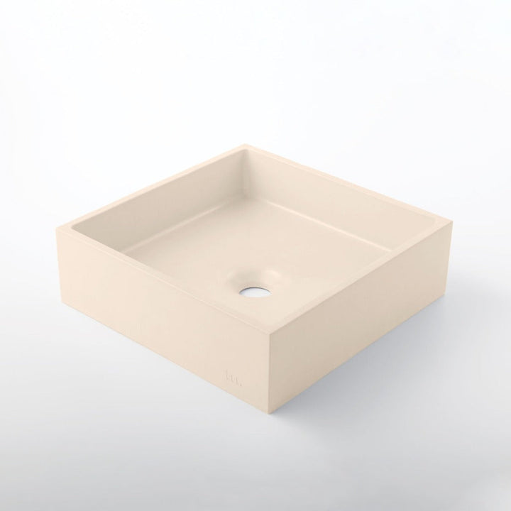 A mudd. concrete Yarra Basin SM sink sitting on top of a mudd. concrete white counter.