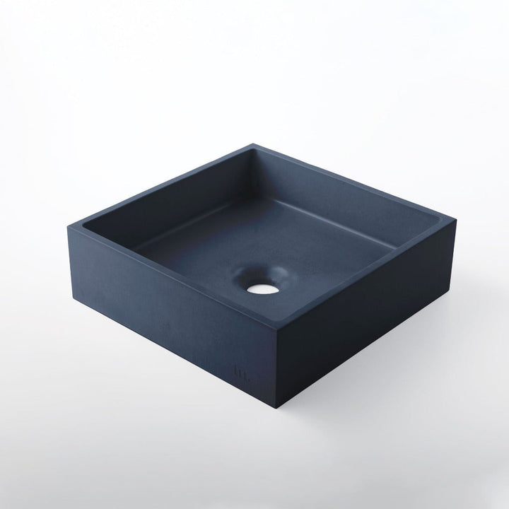 A mudd. concrete Yarra Basin SM sink with a hole in the middle.