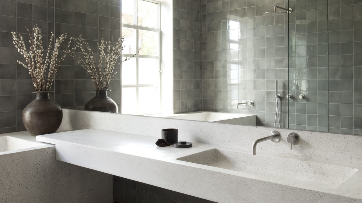 Qtoo taps in a warm, minimal bathroom