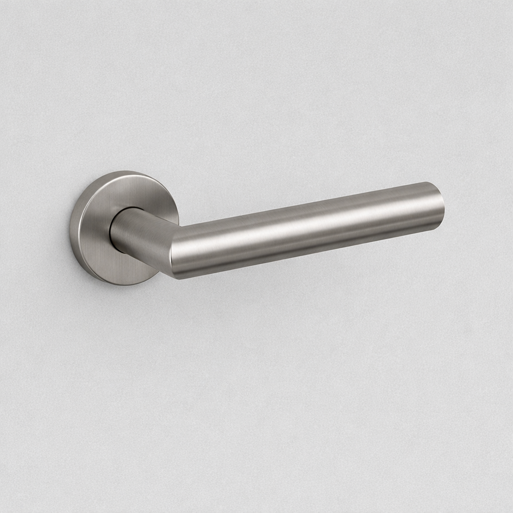 Satin stainless steel AHI 104 door lever, a plain round-bar lever on a round rose.