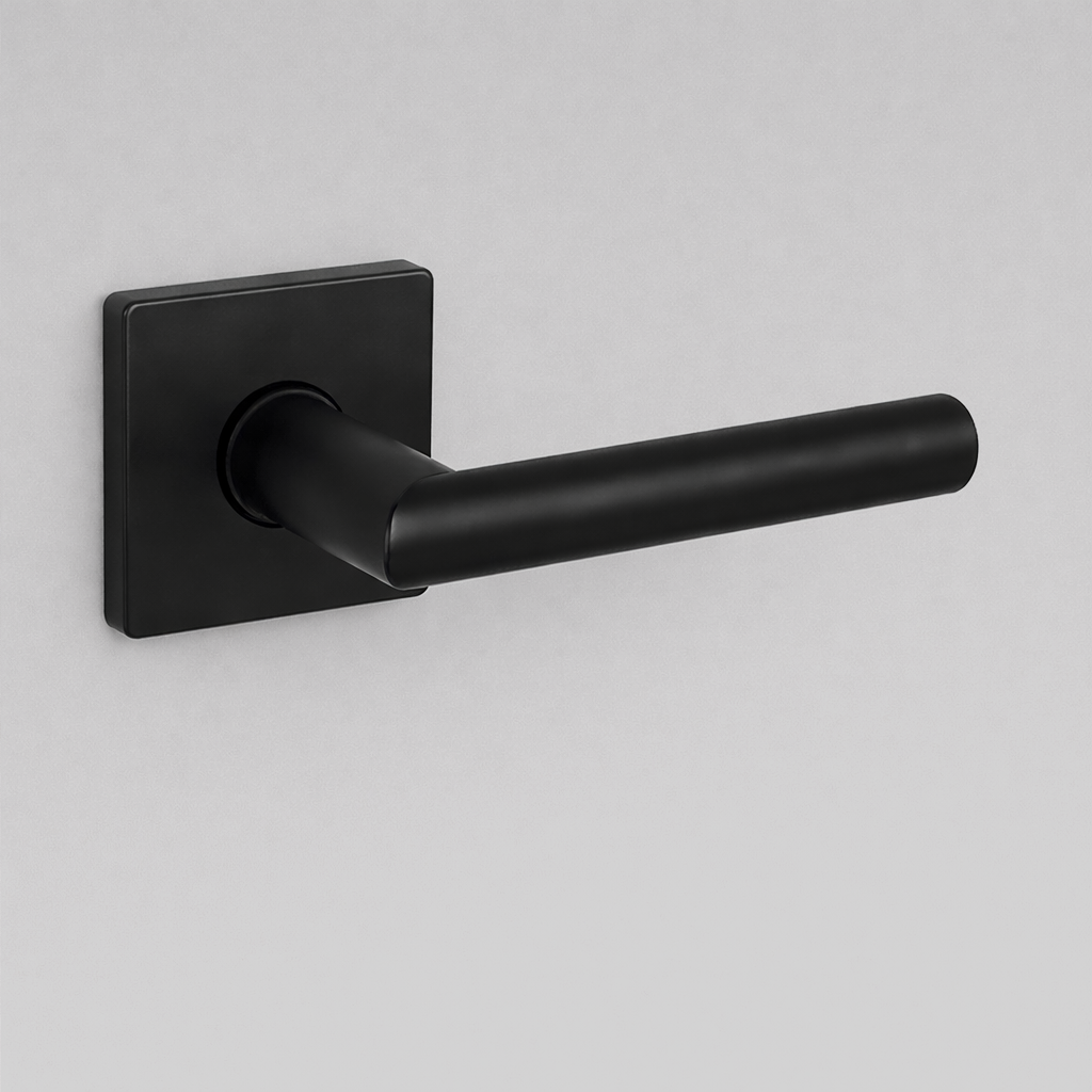 Matte black AHI 104 door lever, a plain round-bar lever on a square rose.