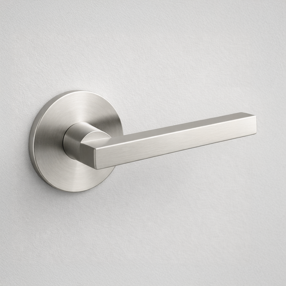 Satin stainless steel AHI 110 door lever, a square-section angular lever on a round rose.