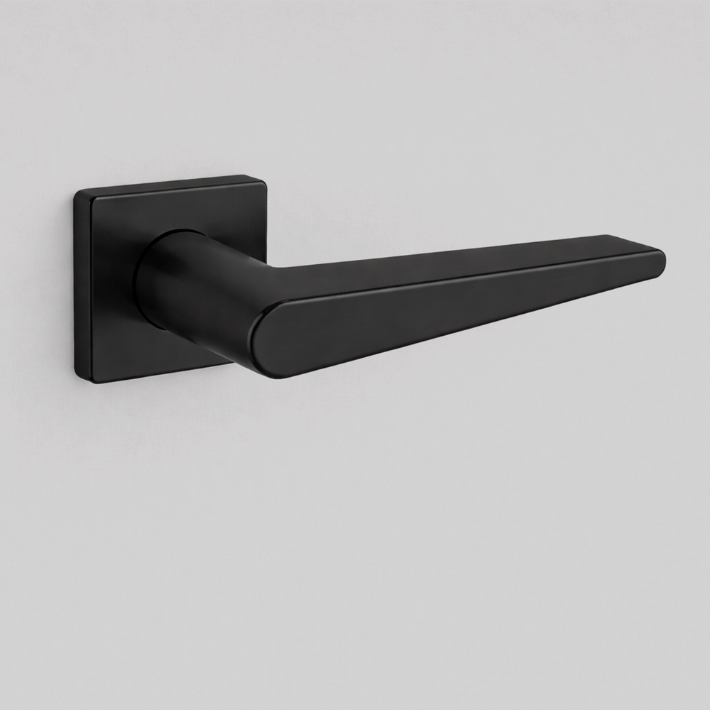 Matte black AHI 135 door lever, an angular flat lever on a square rose.