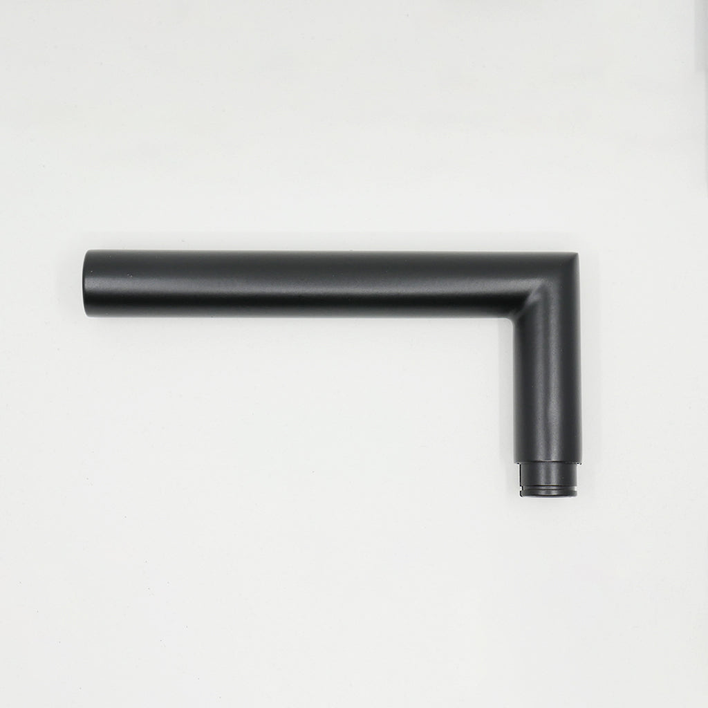 A close up of an AHI Door Lever No. 103 Single Dummy on a white wall.