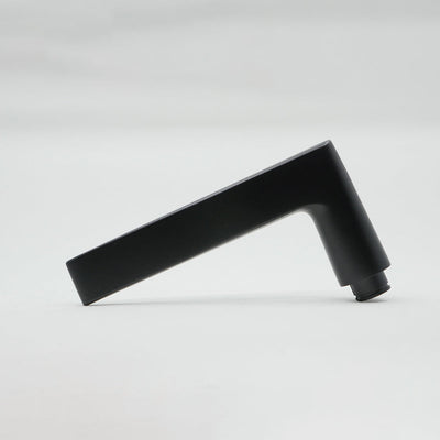 A close up of an AHI Door Lever No. 135 Privacy in black on a white surface.