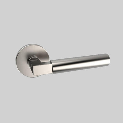 A close up of an AHI Door Lever No. 157 Privacy handle on a door.