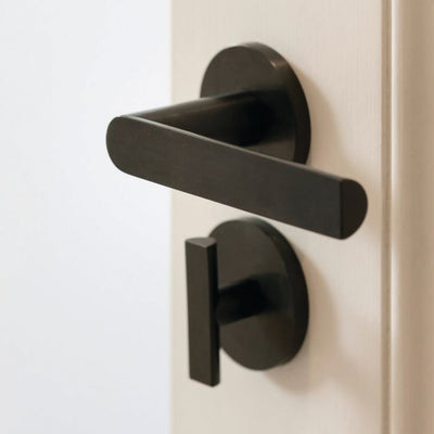 Modern Arc Door hardware in black by Piet Boon