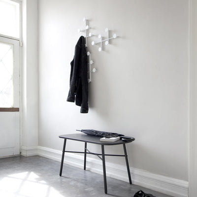 Coat Hanger in Entry with Bench. White and minimal rack design.