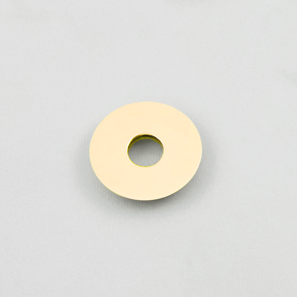 A Maison Vervloet Audrey Fixed Door Knob 100 with a hole in the middle of it.