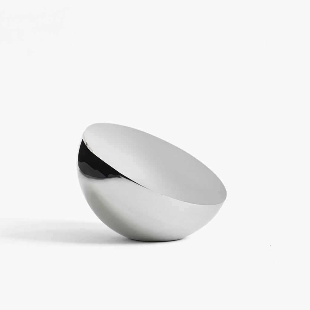 minimal polished metal mirror by New Works