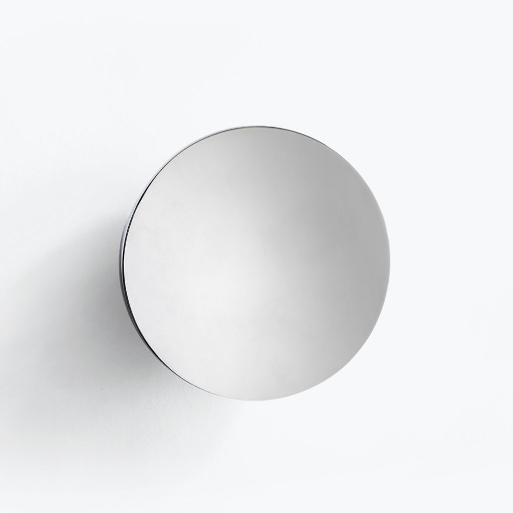 polished stainless steel wall mirror
