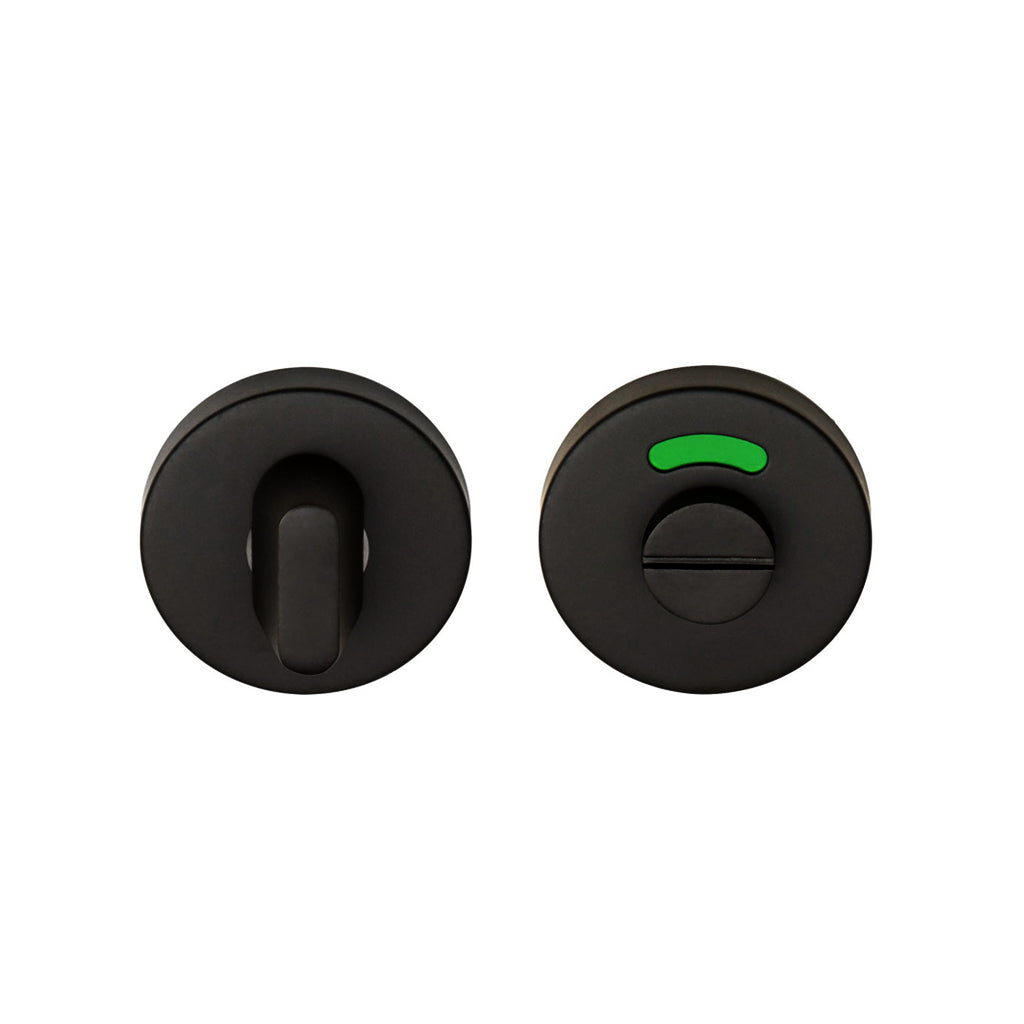 A Formani BASICS LBWC50 Indicator Thumb Turn and Release with a black knob and a green button on it.