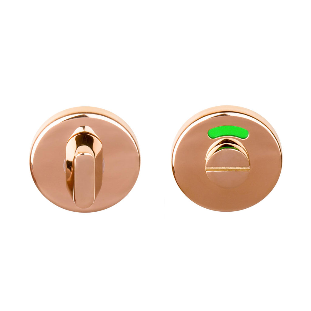 Polished copper Formani BASICS LBWC50 indicator thumb turn with a red-green WC indicator.