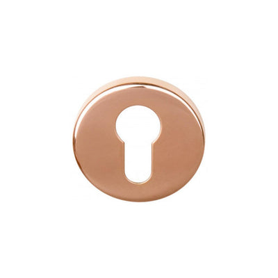 A Formani BASICS LBY50 Cylinder Escutcheon in rose gold plating on a white background.