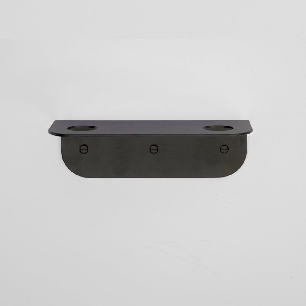 Bende Double Soap Holder in powder coated matte black mounted on white wall with 3 slot head screws