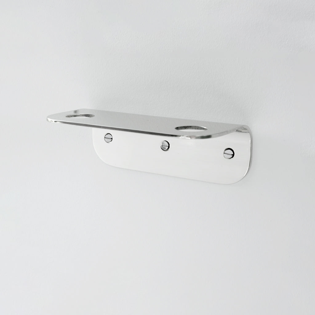 Bende Double Soap Holder in Mirrored Stainless Steel mounted on white wall with 3 slot head screws