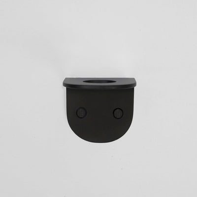 A CSSN BENDE Soap Holder Bracket Single is hanging on a white wall.