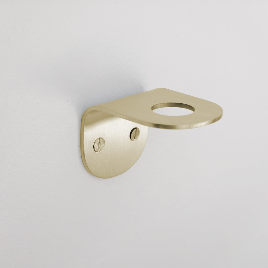 A CSSN BENDE Soap Holder Bracket Single on a white wall.