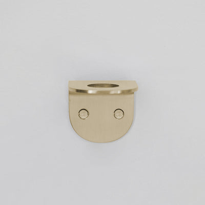 A CSSN BENDE Soap Holder Bracket Single with two holes in the middle.