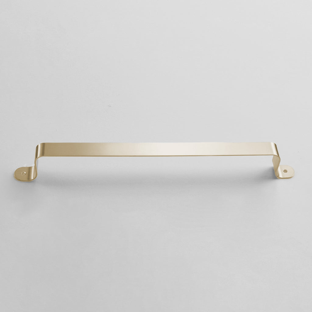 Bende Polished Brass Towel Bar Installed on white wall