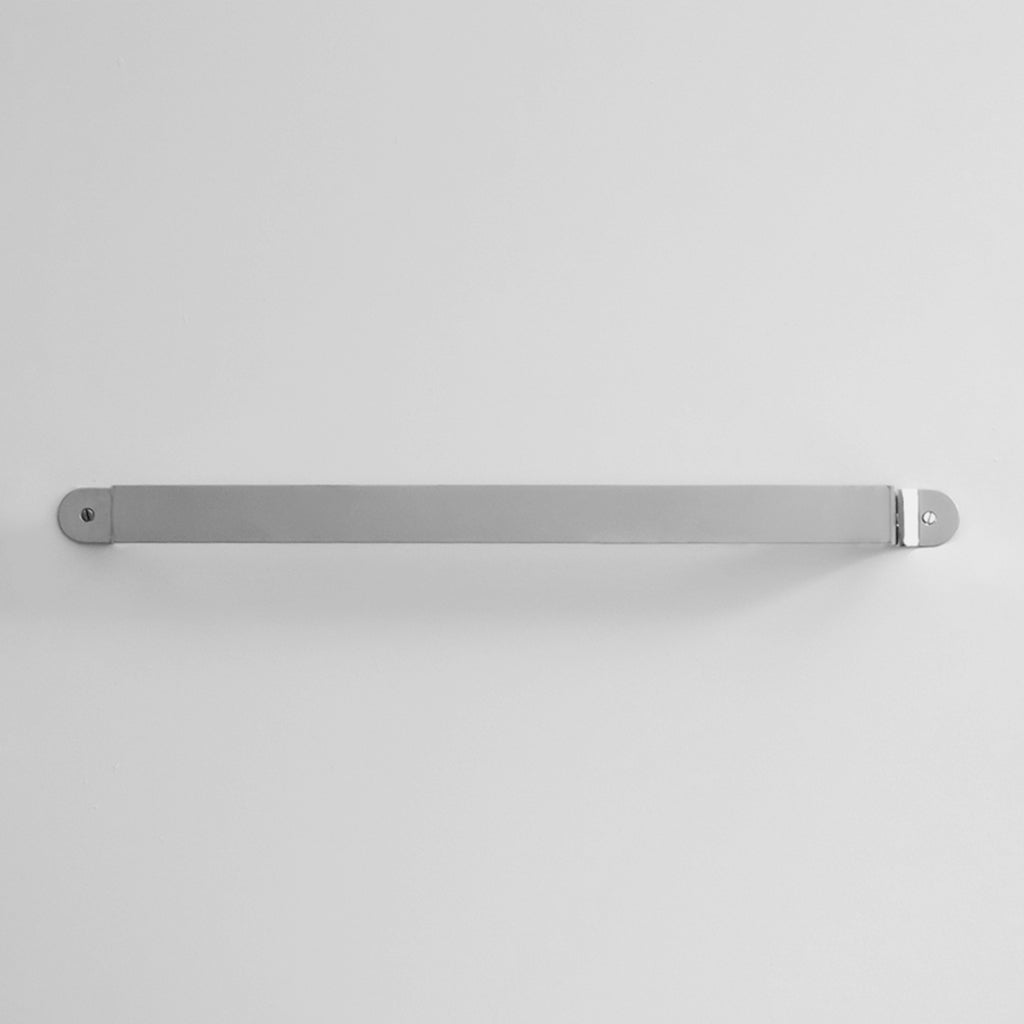 Bende Polished Stainless Steel Towel Bar Installed on white wall