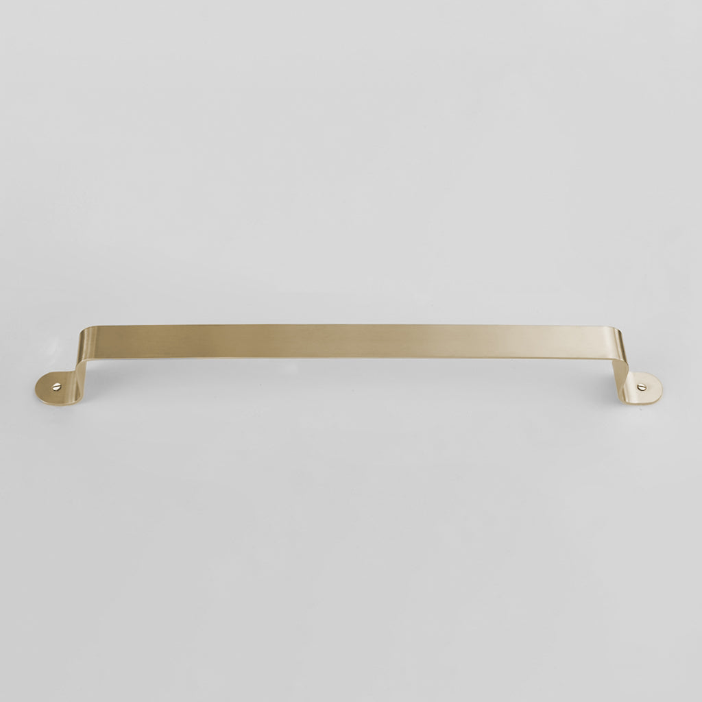 Bende Satin Brass Towel Bar Installed on white wall
