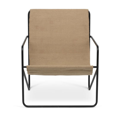 A Ferm Living Black Solid Desert Lounge Chair with a tan seat and black frame.
