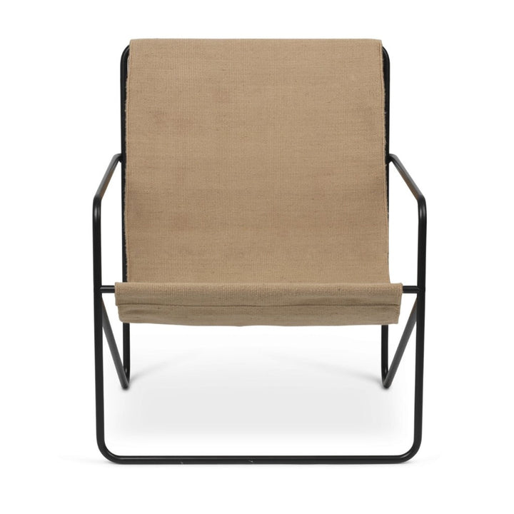 A Ferm Living Black Solid Desert Lounge Chair with a tan seat and black frame.