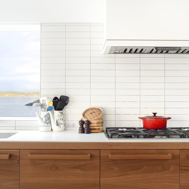 A Bocci 22: Alternate Material Mounting stove top oven sitting inside of a kitchen.