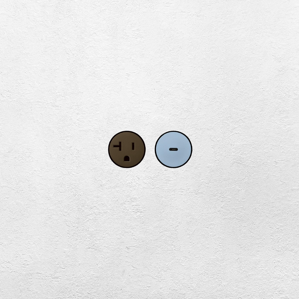Two colorful flush style sockets by Bocci22, one Carob brown and one Ice blue, on a white textured background.