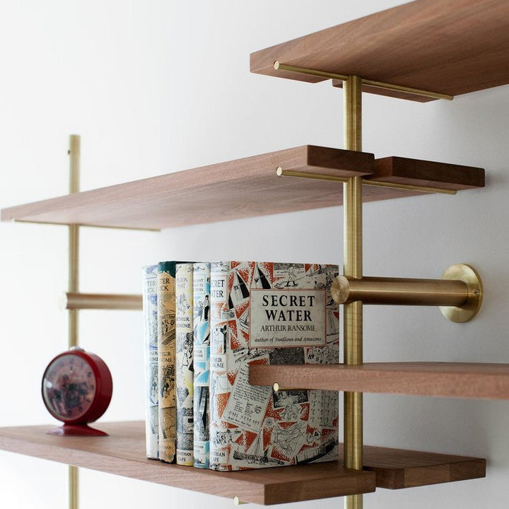 Beautiful brass and wood modular shelving