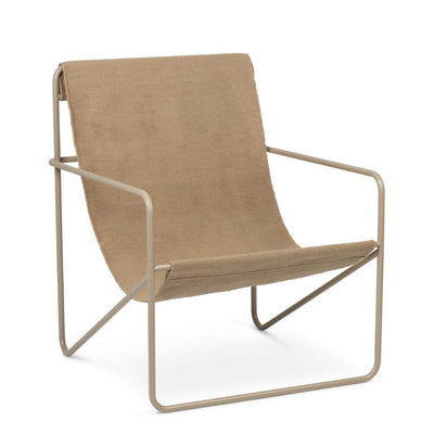 A Cashmere Solid Desert Lounge Chair by Ferm Living with a metal frame on a white background.