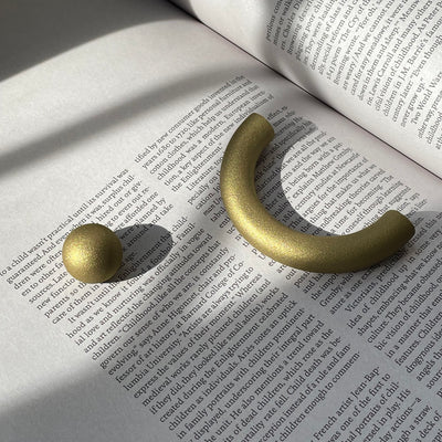 solid cast natural and white brass and bronze small cabinet hardware knob and handle by Maha Alavi