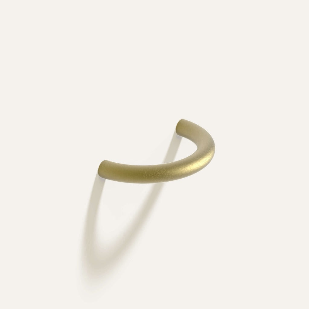 Satin brass Maha Alavi Cercle thin long pull, a slender elongated cast arc.