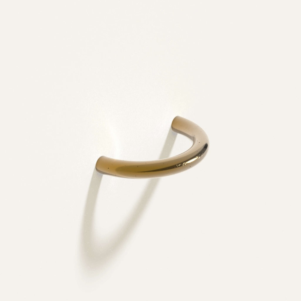 Satin brass Maha Alavi Cercle thin long pull, a slender elongated cast arc.
