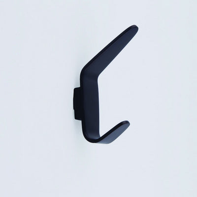 A close up of a CBH Charlie Angular Hook on a wall.